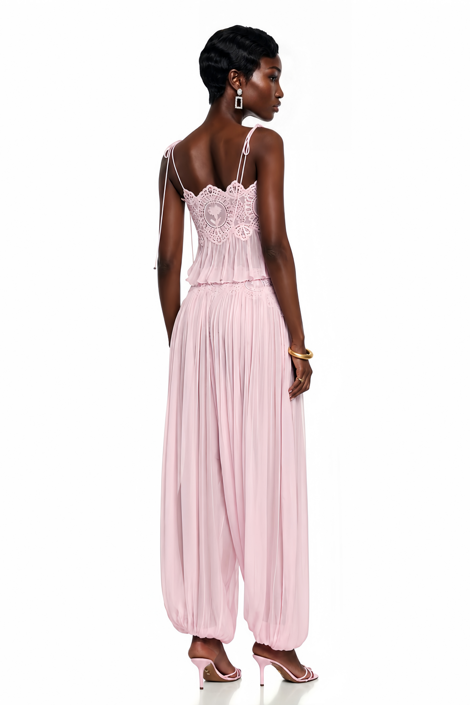 Light pink pleated two-piece set featuring a lace-trimmed camisole crop top and matching wide-leg harem pants